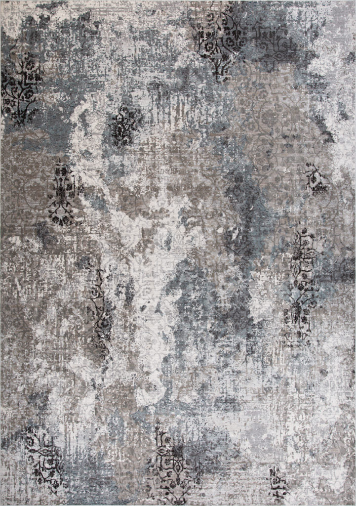 The STEVENS OMNI RUGS Opulence 1X 5'x8' Area Rug features a faded floral abstract design and premium, luxurious materials.