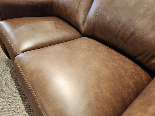Close-up of the Orangeville Leather Loveseat by Leather Craft, featuring premium leather and fine craftsmanship.