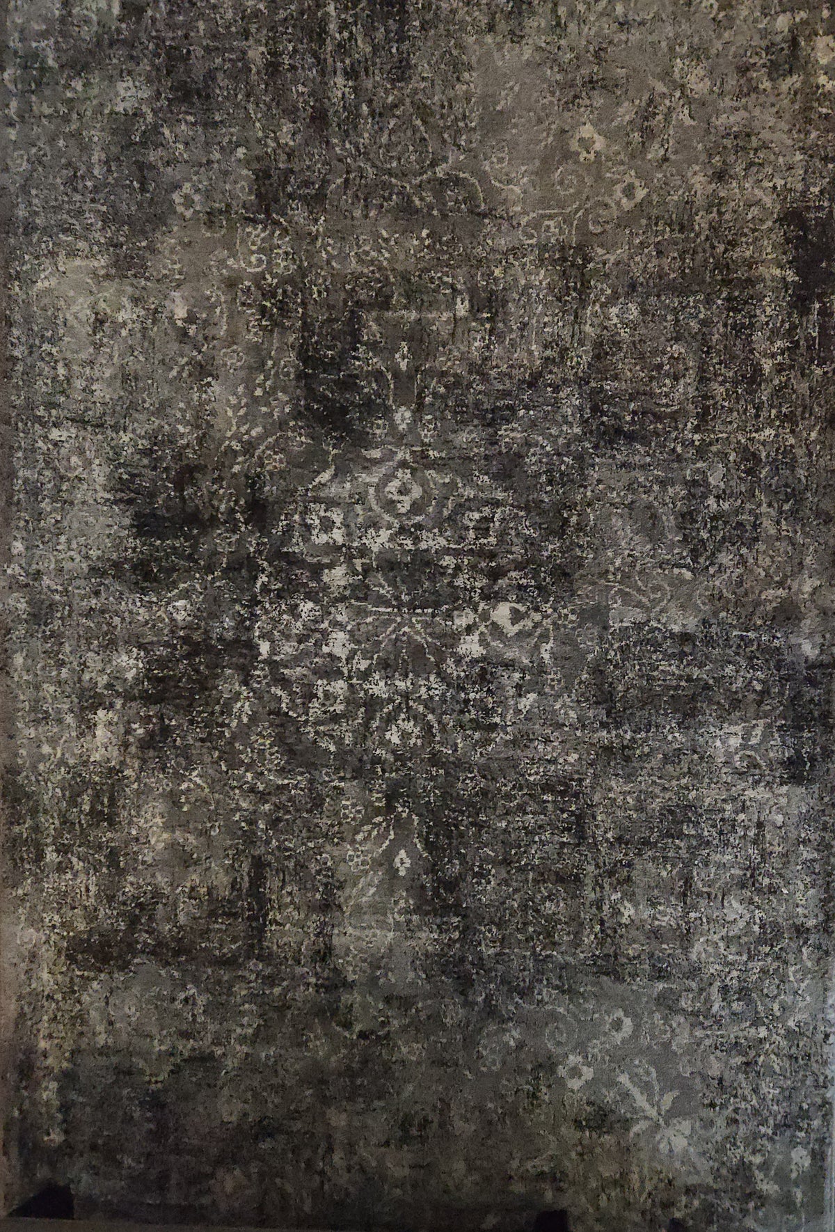 The Rizzy Home Panache PN6971 5'3" x 7'6" Area Rug adds modern Bohemian flair with faded floral and geometric designs.