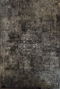 The Rizzy Home Panache PN6971 5'3" x 7'6" Area Rug adds modern Bohemian flair with faded floral and geometric designs.