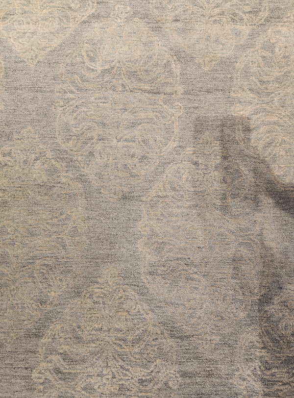 Green area rug with an ornate Bohemian pattern in a lighter shade from Rizzy Home.