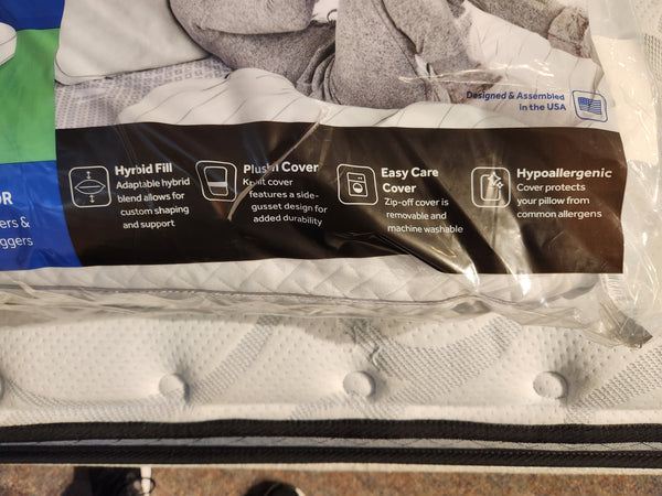 Close-up of the Sealy Custom Comfort Pillow packaging highlighting features: hybrid fill, plush cover, easy-care zip-off machine washable cover, and hypoallergenic protection. Ideal for side sleepers seeking comfort and support.