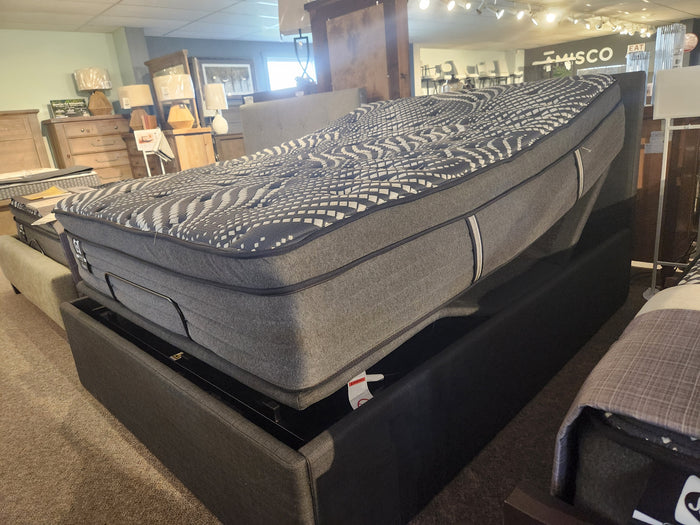 Julien Beaudoin Ergo Box Adjustable Frame with patterned mattress, head elevated, displayed in showroom.
