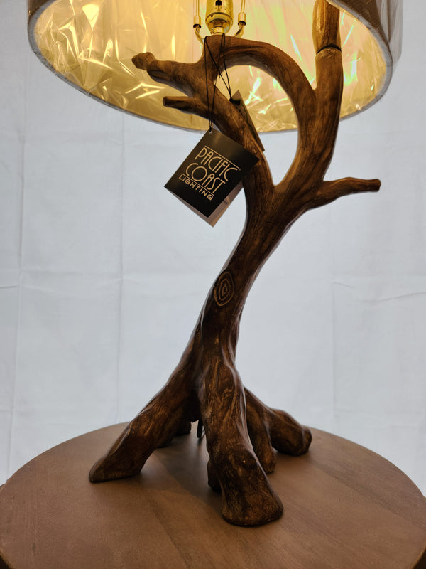 The Pacific Coast 87-8036-48 Beachwood Table Lamp features a branch-like faux wood base and a burlap shade.