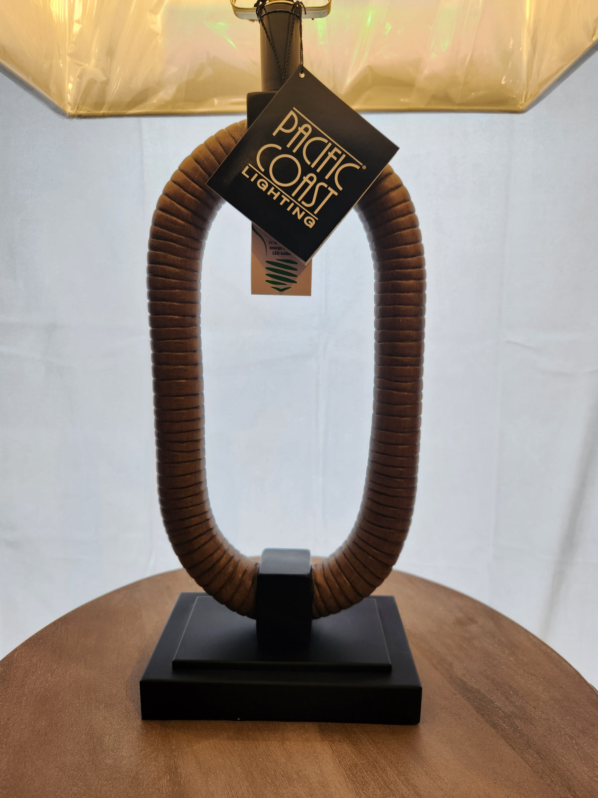 The Pacific Coast 310C1 Egan Table Lamp set of 2 features oval rope bases and black rectangular stands for a nautical look.