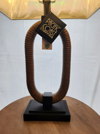 The Pacific Coast 310C1 Egan Table Lamp set of 2 features oval rope bases and black rectangular stands for a nautical look.