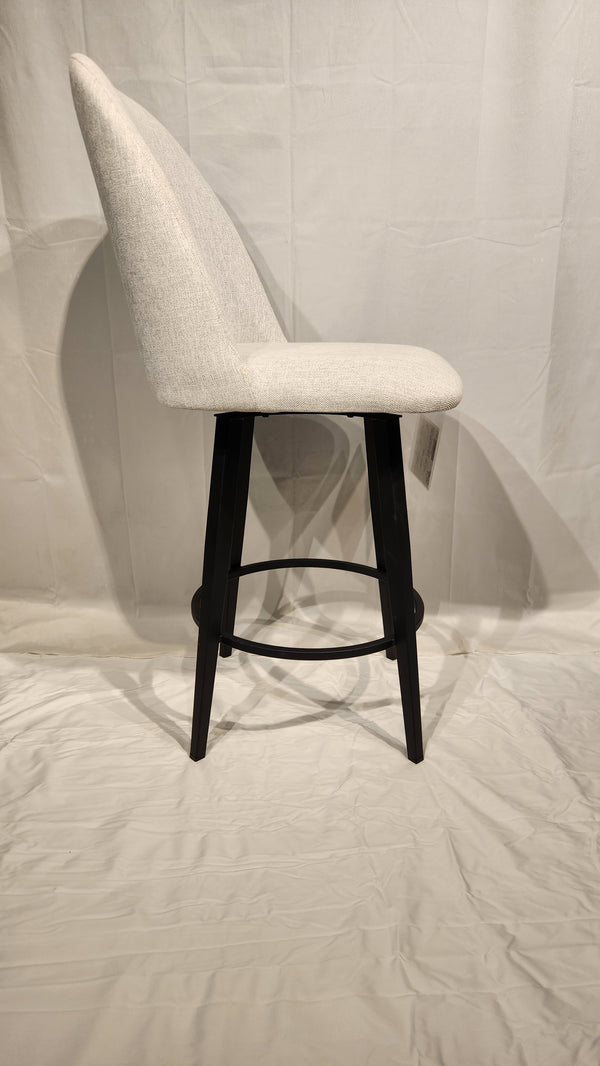 Zahra Counter Height Swivel Bar Stool by Amisco with white upholstery, curved backrest, and black legs on a plain background.