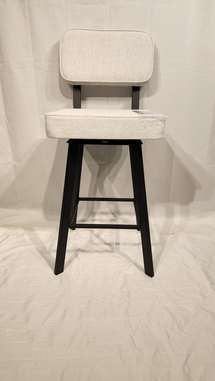 The Amisco Brixton Swivel Stool features a white cushion, black wooden legs, and durable fabric.