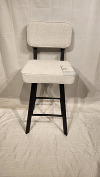 The Brixton Counter Height Swivel Bar Stool by Amisco features light grey fabric and black metal legs on a white background.