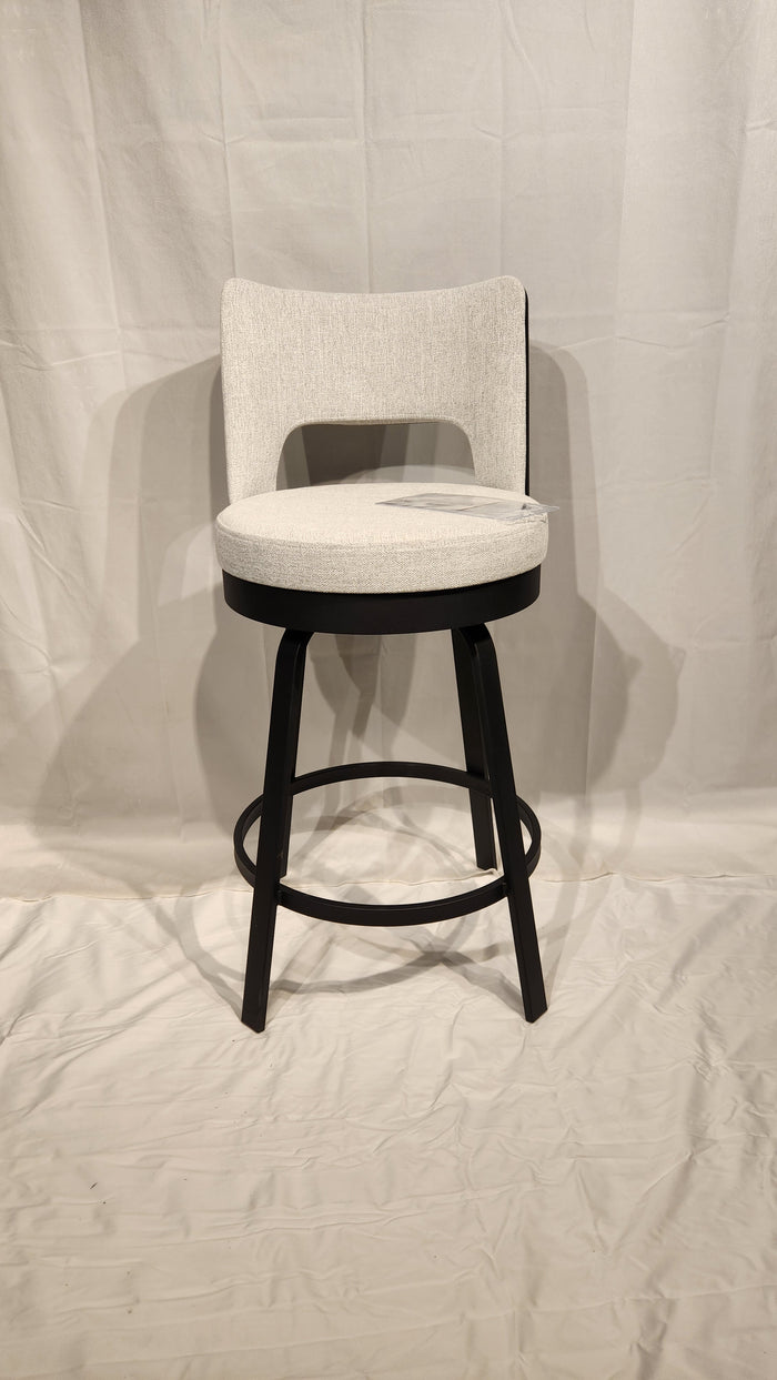 The Amisco Brock Counter Height Swivel Bar Stool features a cushioned seat, dark wood legs, and circular footrest.