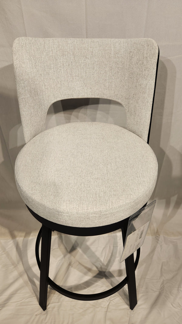 The Amisco Brock Counter Height Swivel Bar Stool features a modern, light gray seat and curved backrest with dark wood legs.