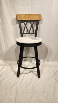 The Amisco Brittany Swivel Bar Stool features a cushioned seat, curved back, and black metal legs with vintage finishes.
