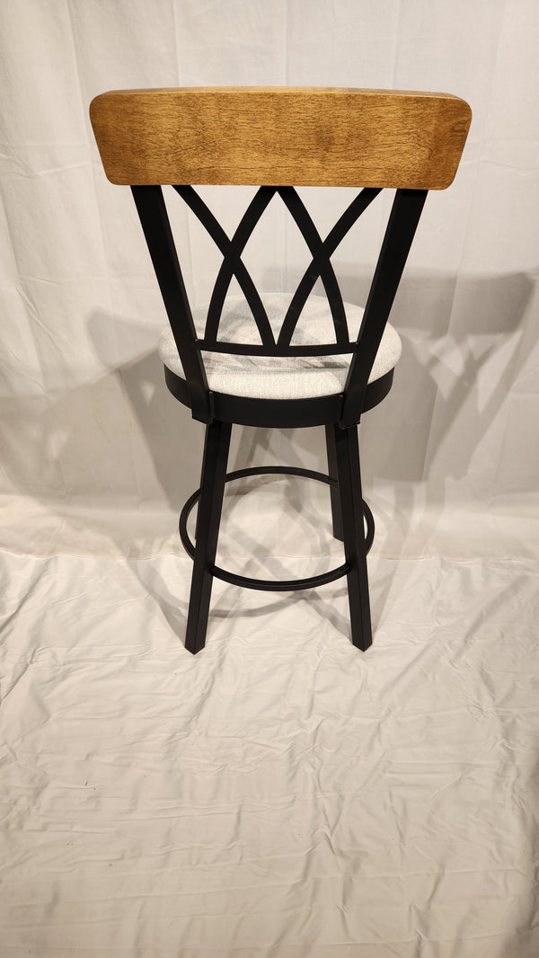 The Amisco Brittany Counter Height Swivel Bar Stool features vintage finishes and a light cushion, shown on a white background.