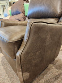 Leather Craft 749 Chair with visible armrest and cushion stitching, shown on a carpeted floor.