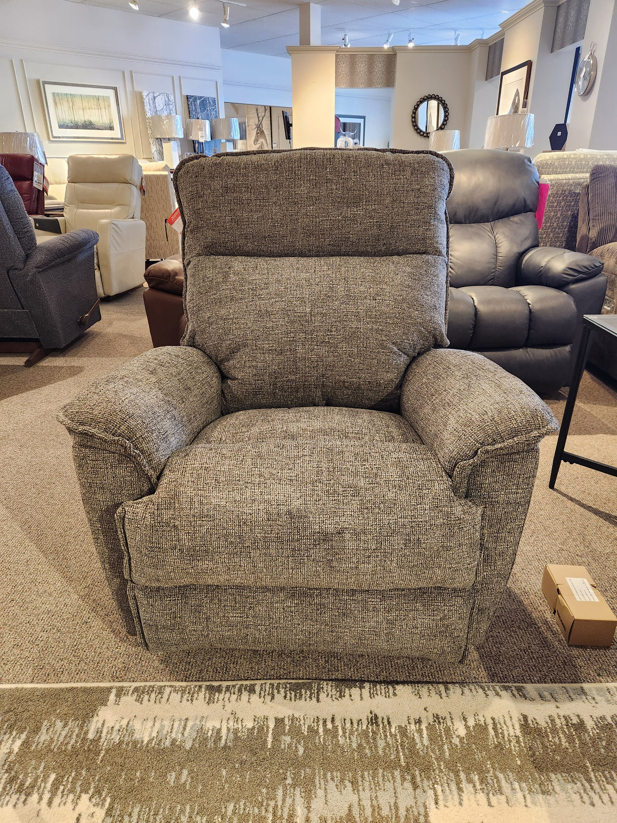 The 706 Jay Power Rocker Recliner by La-Z-Boy, a gray upholstered chair that exudes casual style and comfort.