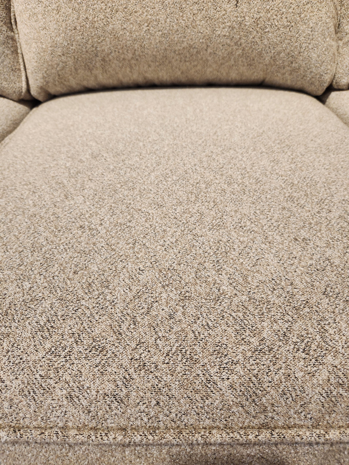 Close-up of Decor-rest's 2179 Queen Sofabed with beige upholstery, subtle texture, and seam details. Made in Canada.