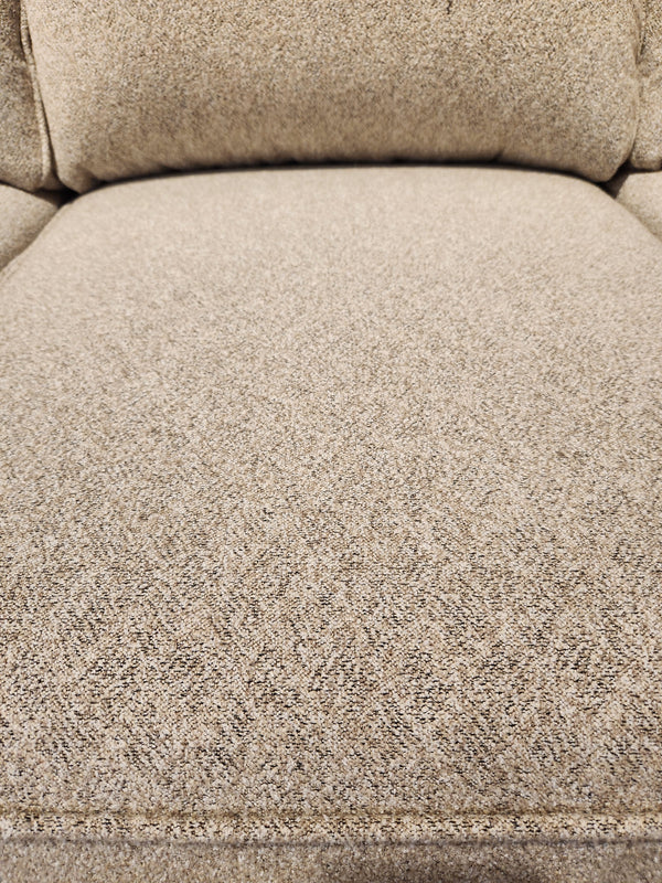 Close-up of Decor-rest's 2179 Queen Sofabed with beige upholstery, subtle texture, and seam details. Made in Canada.