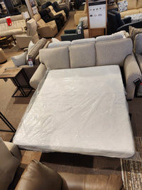 Showroom display of the Decor-rest 2179 Queen Sofabed, a Canadian-made model with a memory gel foam mattress and other furniture.
