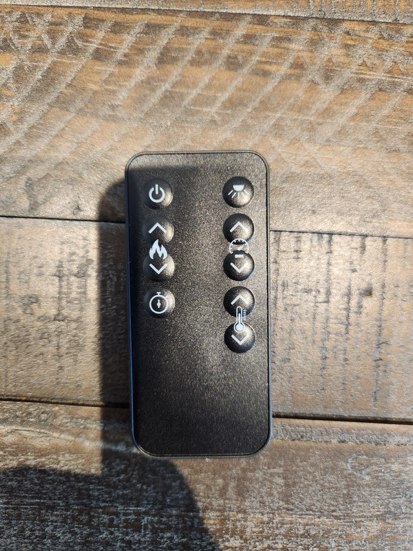 The Jofran Madison mantel's sleek black remote, with 8 icon buttons, seamlessly manages your cozy media space.