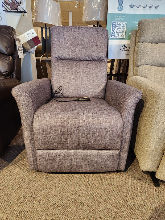 Thorley Power Lift Chair by Primo: Gray upholstery, pocket spring seat, remote control, elegantly set in showroom.