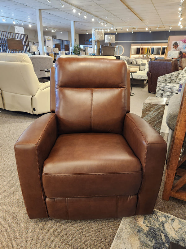 Muskoka Power Reclining Chair by Aurora Furniture in brown leather with moccasin stitching, shown with matching furniture.