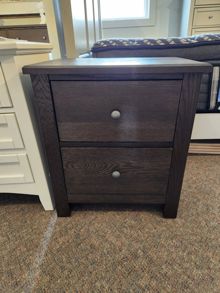 The 10-226 Night Stand by Vaughan Bassett features a Louis Philippe style with two drawers and round knobs on display.