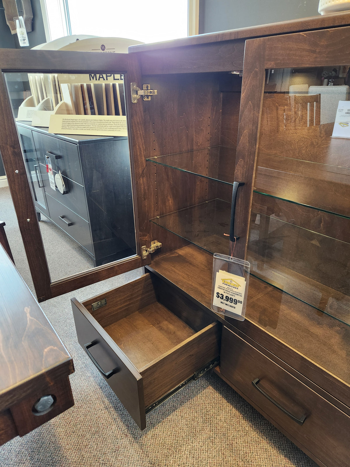 Handstone Laguna Dining Sideboard with Pot Lights offers ample storage, glass shelves, and costs $3,899.99.