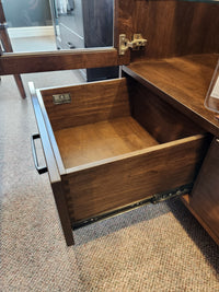 A Laguna Dining Sideboard with Pot Lights by Handstone shows its Smooth Maple Carob finish and metal drawer slides.