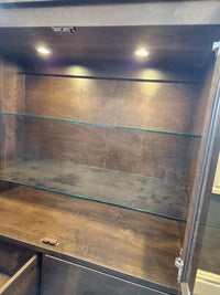 Handstone Laguna Dining Sideboard in Smooth Maple Carob with pot lights, glass shelves, and spacious storage.