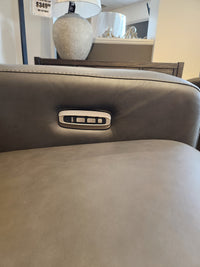 Close-up of La-z-boy 811 Acadia Power Reclining Sofa armrest with three buttons for customizable headrest support.