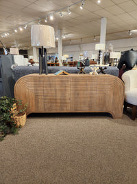 The Mercana 70838 Sorina Reverse Fluted Sideboard in solid mango wood is showcased with lamps and decor.