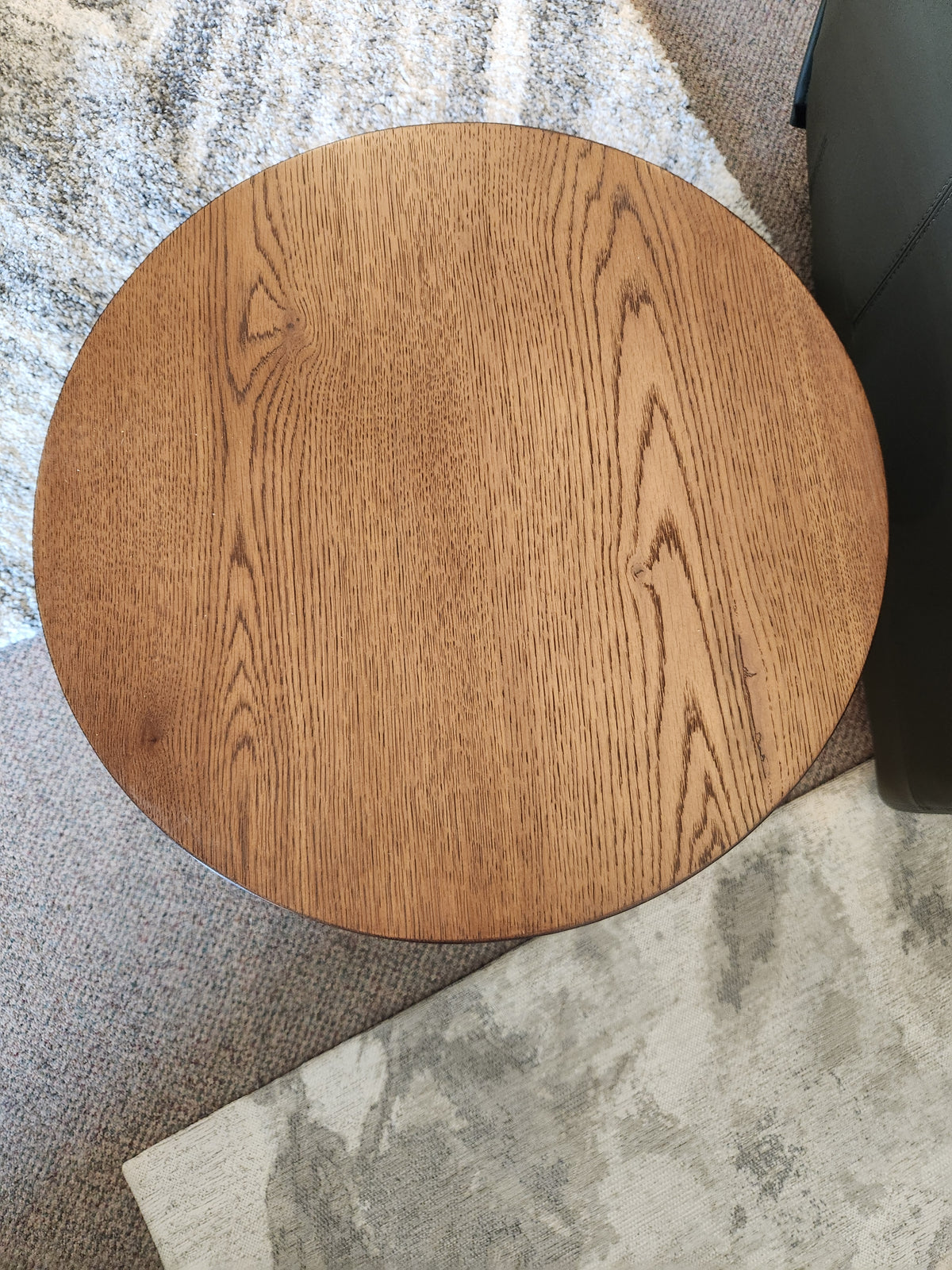 The Rory 22" End Table by Donald Choi features a round black oak veneer top, perfect for small spaces and accent use.