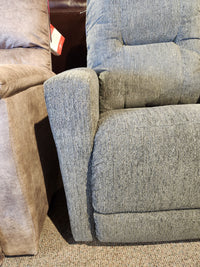 Close-up of the armrests and seats of two La-Z-Boy 767 Casey Power Rocker Recliners, gray and tan, on carpet.
