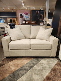 The Decor-rest 2981 Loveseat features box seat cushions and two patterned pillows, perfect for any stylish space.
