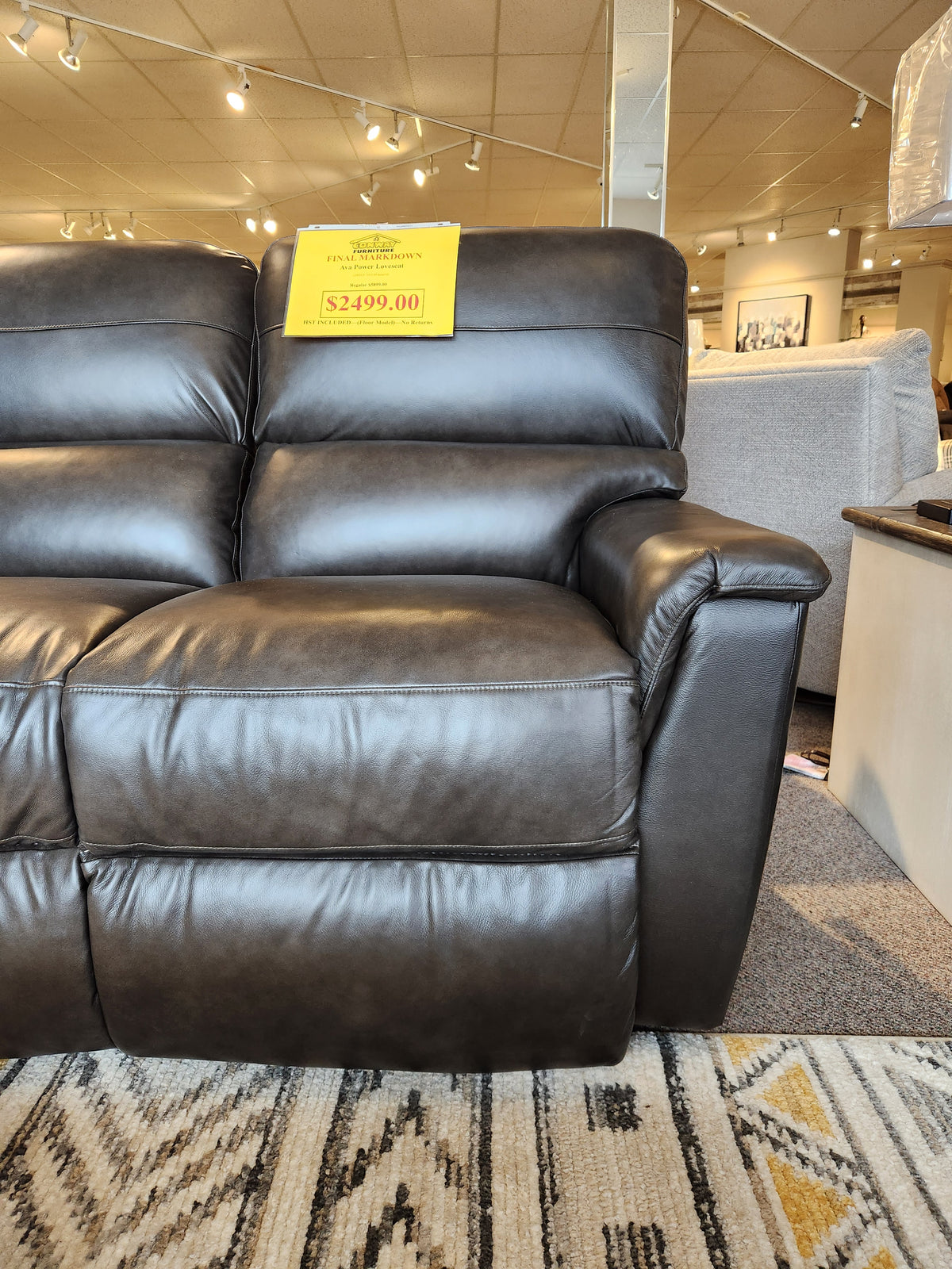 The La-z-boy 769-U48 Ava Power Loveseat reclines for comfort; price above seat lists $2,499.00.