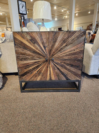 The Jofran 1928 Astral Plains 2 Door Cabinet features a starburst front, perfect for any showroom display.