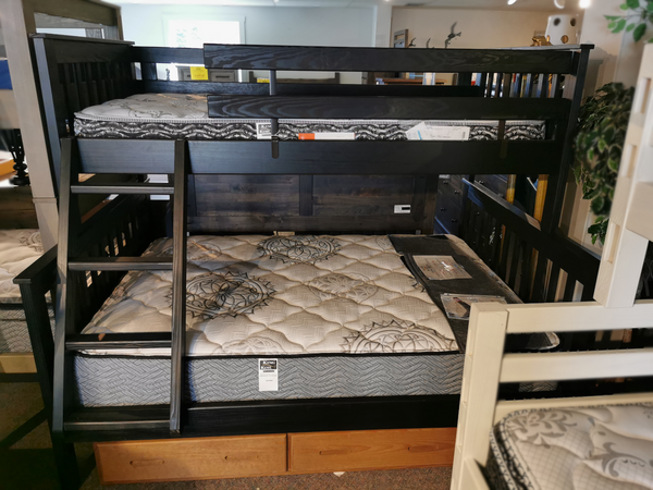 Crate E4706 Twin Over Double Bunk Bed in Mission style with drawers, displayed in a furniture store.