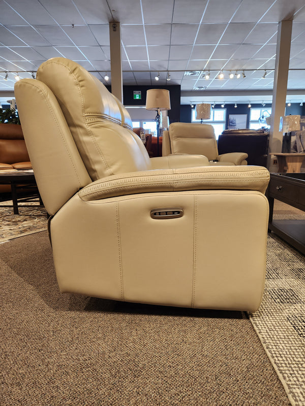 Side view of the Cascade Power Loveseat by Aurora Furniture, displayed in the showroom with a power headrest.