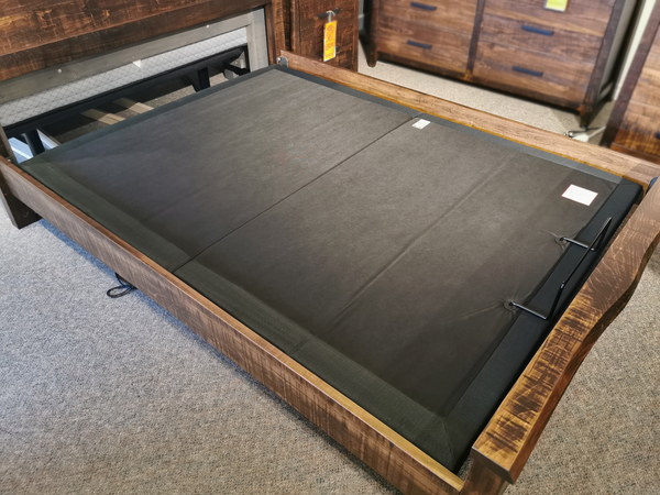 The Elegance Adjustable Base by Fashion offers customizable comfort and lifts to reveal a black-lined storage compartment.
