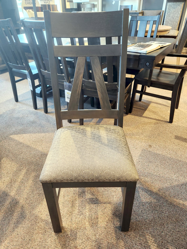 Handstone BE4260 Belmont Dining Package side chair with patterned cushion, shown on carpeted showroom floor.