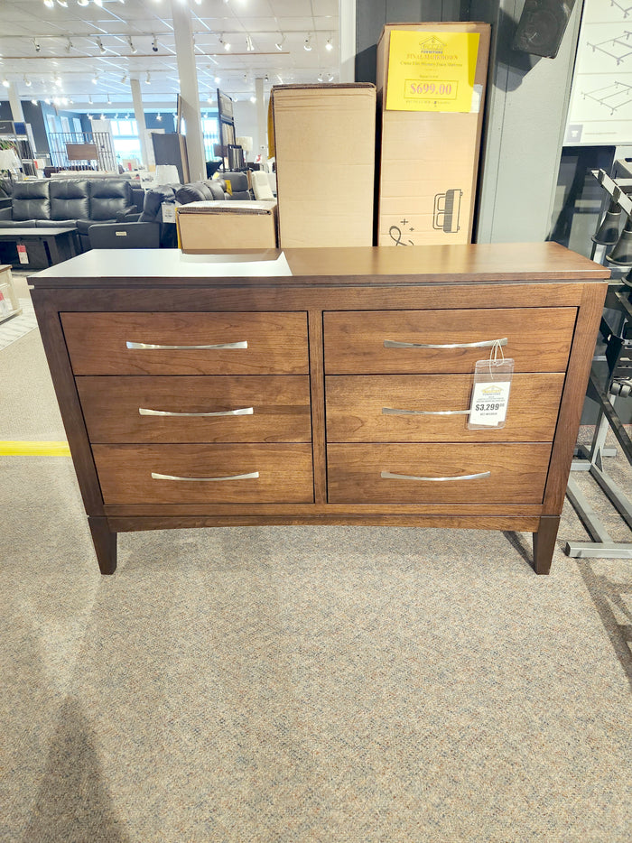 The Handstone CA18 Catalina 6-Drawer Dresser features metal handles and classic style.
