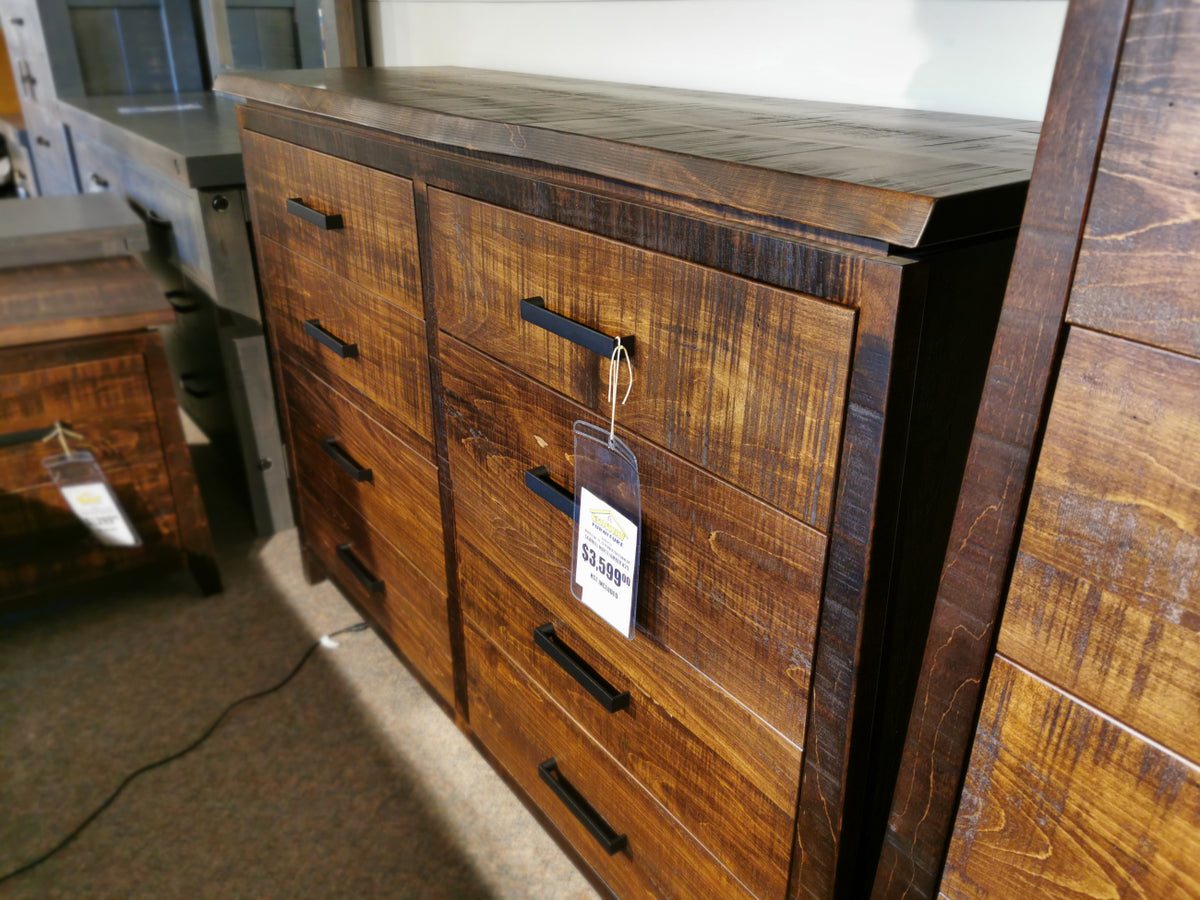 The Handstone PE-28 Pemberton 8 Drawer Dresser with sculpted curves and metal hardware is shown with a price tag.