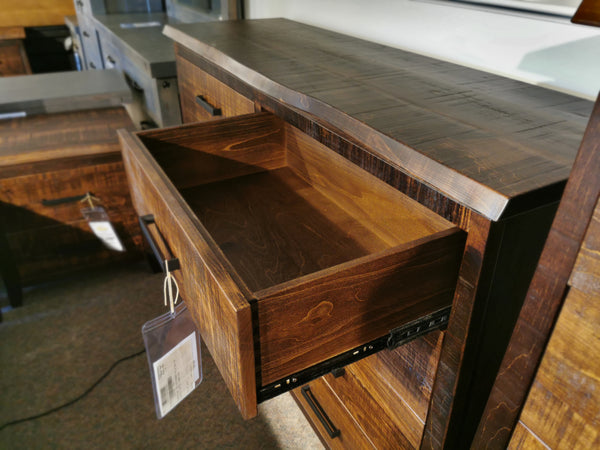 Handstone PE-28 Pemberton 8 Drawer Dresser with sculpted curves, custom metal hardware, drawer open in showroom.
