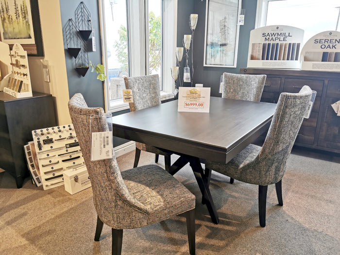 The Handstone LA426 Laguna Dining Package with handcrafted wood and mid-century chairs is displayed in the showroom.