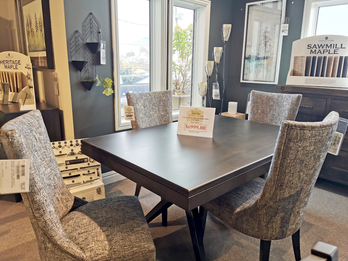 The Handstone LA426 Laguna Dining Package is displayed in a showroom with price tags visible.