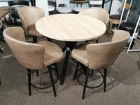 A 39" Laminate Round Biscotti/Asterisk Table Package by Amisco with tan swivel chairs and steel legs on carpeted flooring.