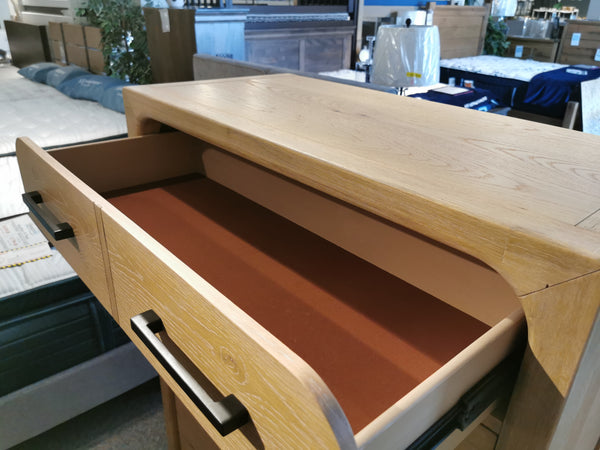 The Magnussen B5684 Somerset Drawer Chest features knotty white oak veneer and brown felt-lined drawers.