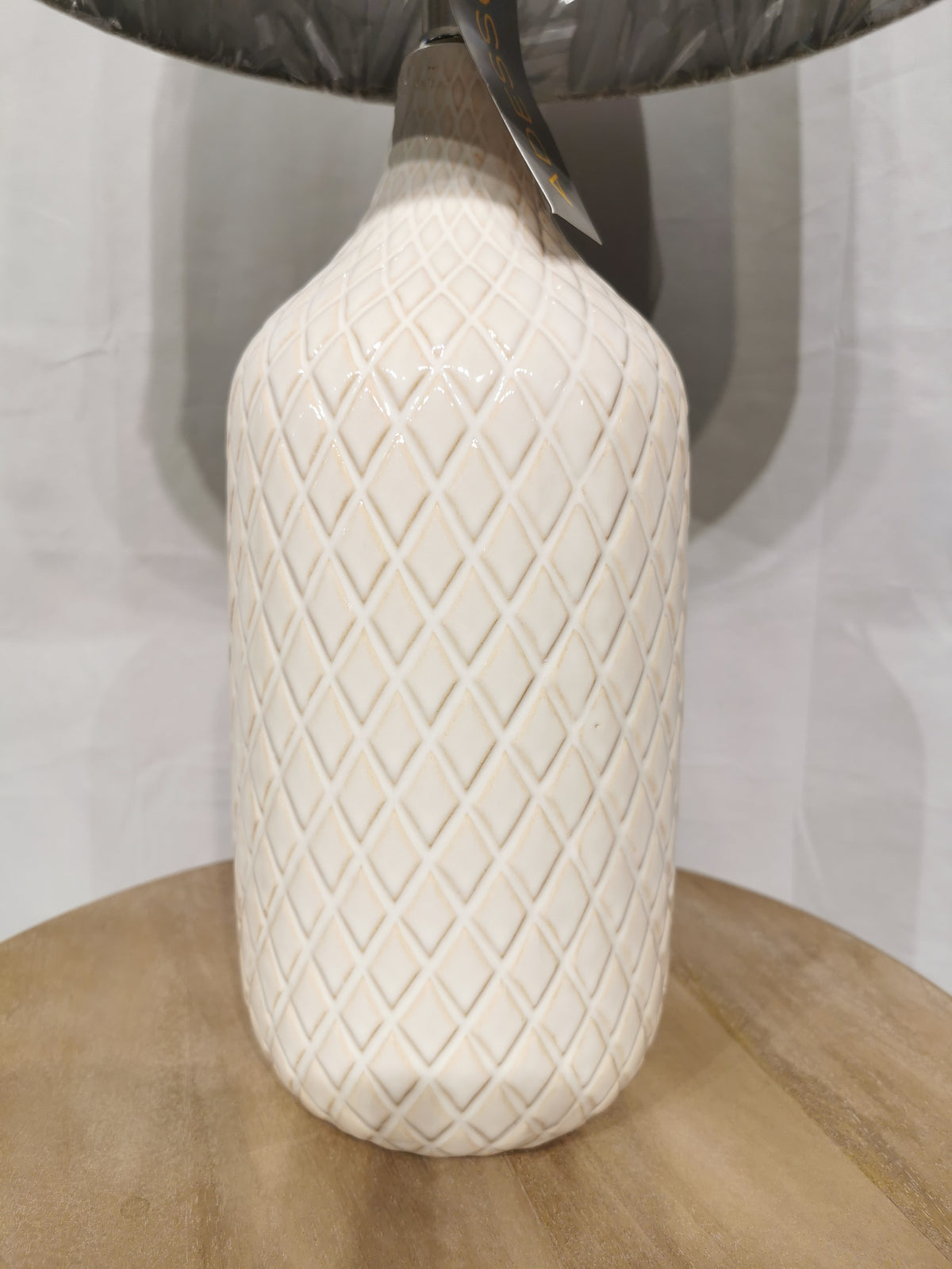 The Adesso Lamp Kathryn 2 Pack Table Lamp adds chic style to any wooden surface.