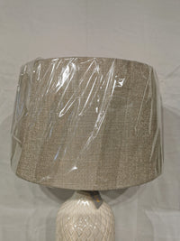 The Kathryn 2 Pack Table Lamp by Adesso Lamp features beige fabric shades and ceramic bases, perfect for elegant decor.