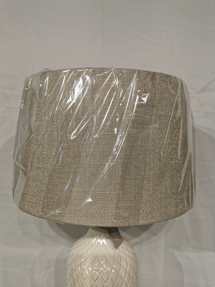 The Kathryn 2 Pack Table Lamp by Adesso Lamp features beige fabric shades and ceramic bases, perfect for elegant decor.